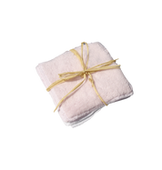 multiples lingettes blanche et rose avec un noeud de raphia